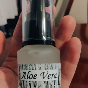 Aloe Vera 100% pure in a 2 Oz Glass Dispenser Bottle